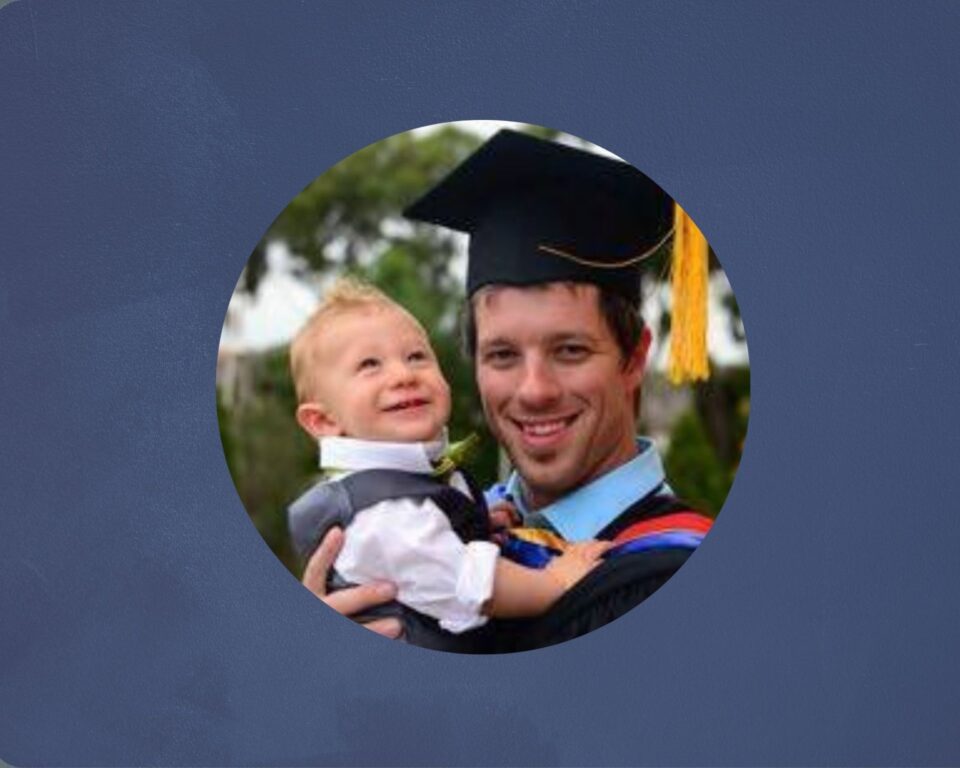 Medical graduate with his son