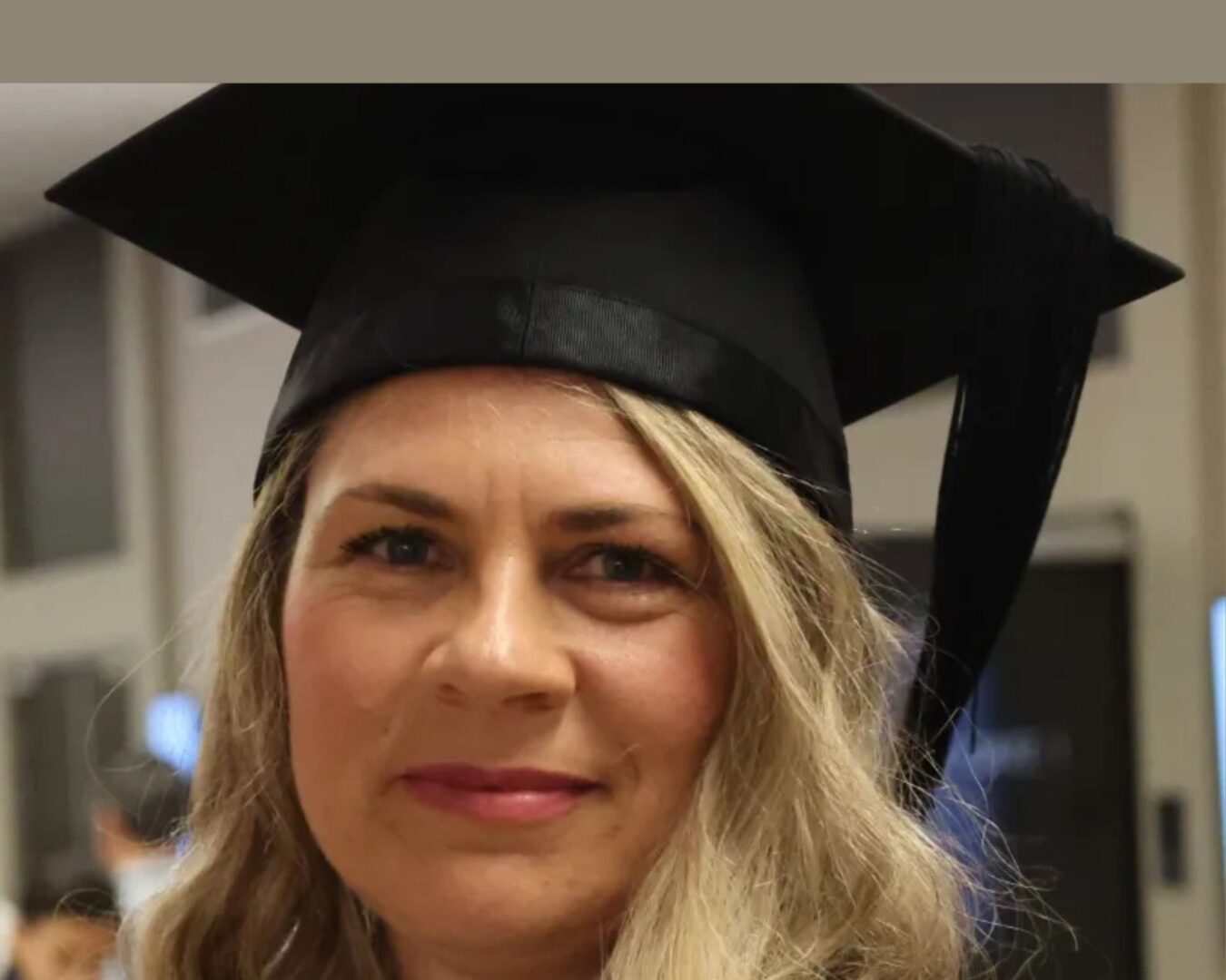 blond female medical graduate