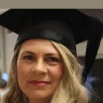 blond female medical graduate