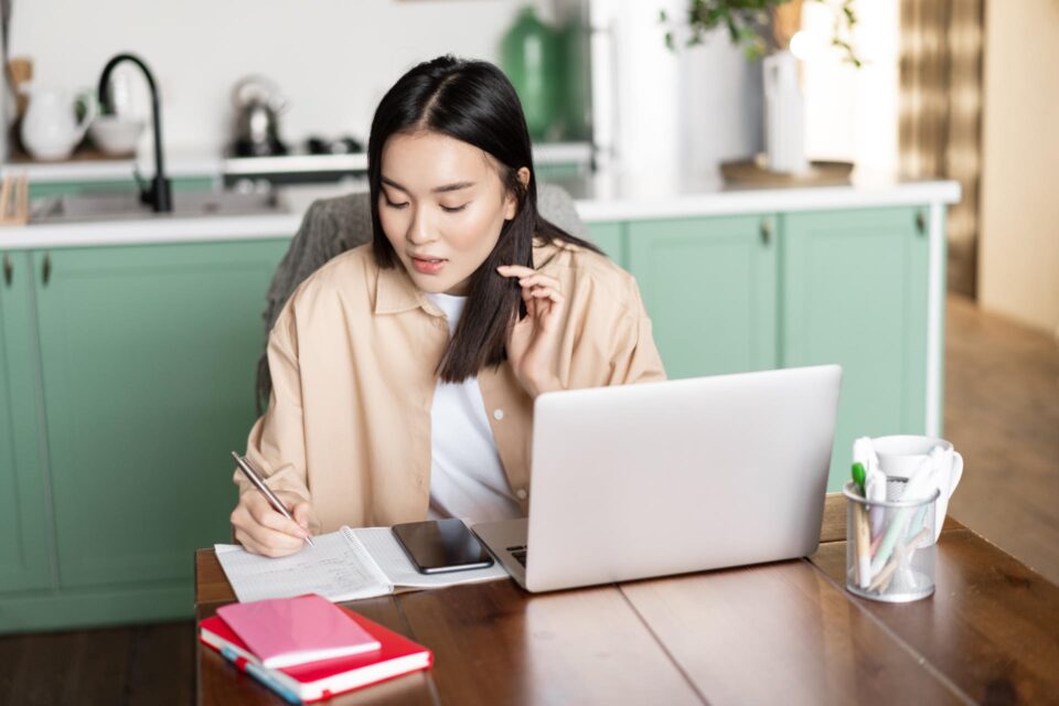 Asian girl doing homework