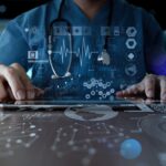 Medicine doctor hand working with modern computer interface as medical network concept