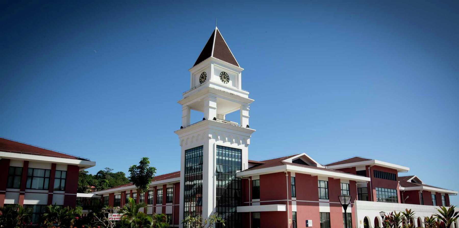 Blue sky clock tower at TTM Hospital in Samoa Oceania University of Medicine